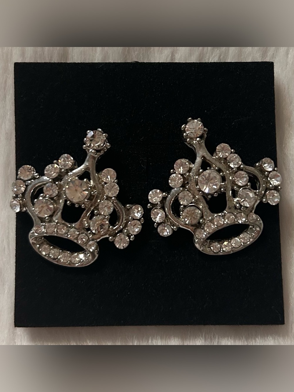 Silver tone rhinestone crown earrings